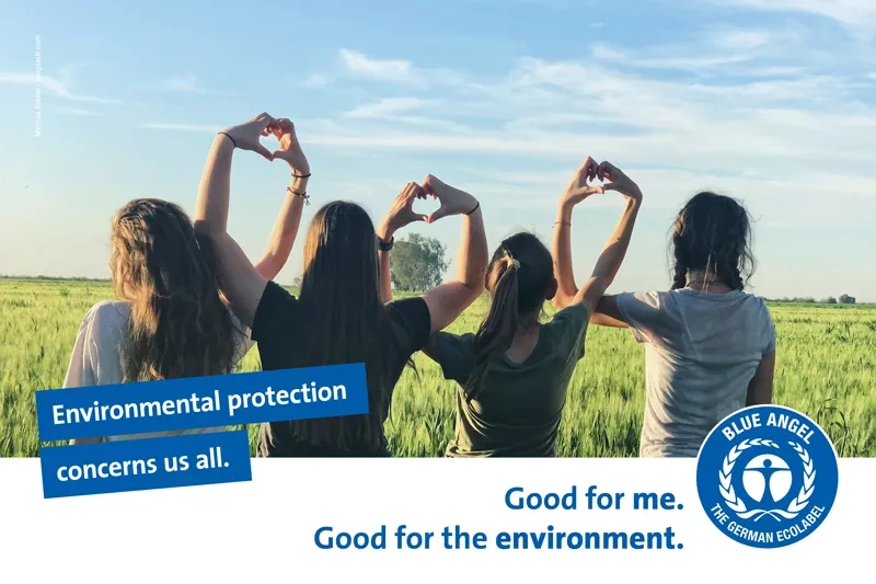 Four teenage girls form a heart with their hands. Slogan: Environmental protection concerns us all.