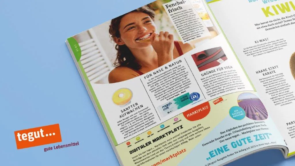 tegut logo and an open magazine