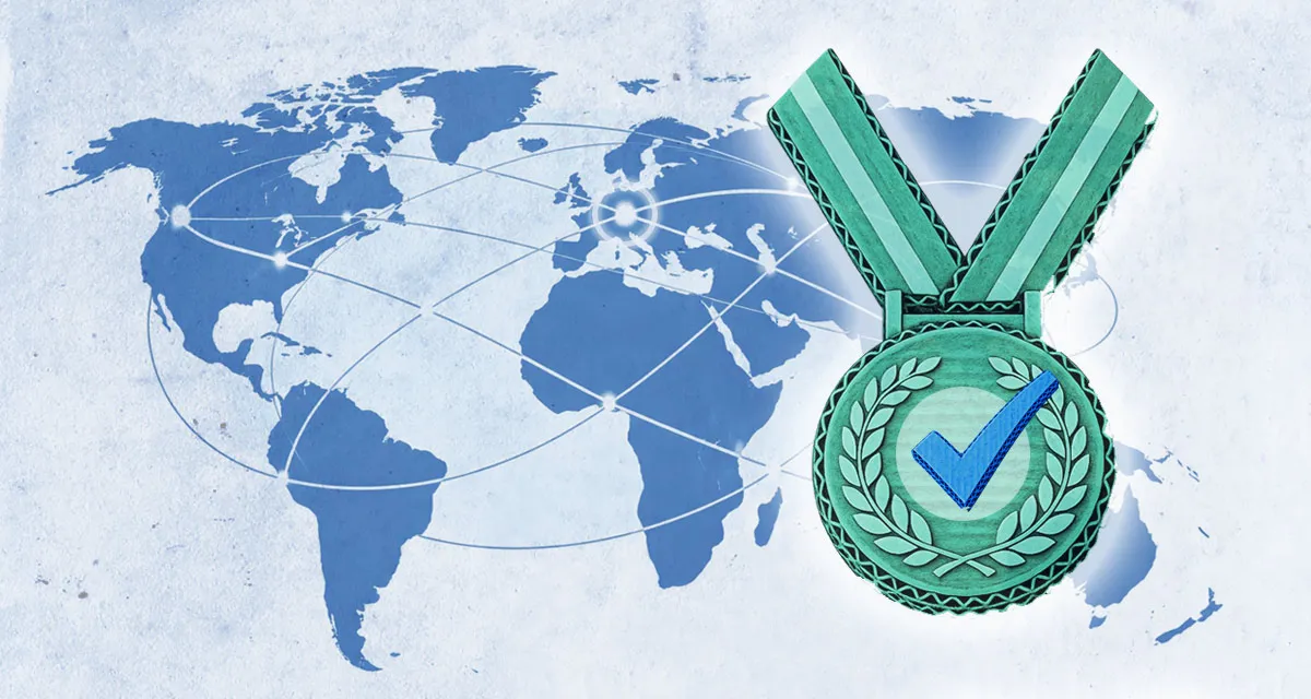A world map illustration in blue featuring a medal